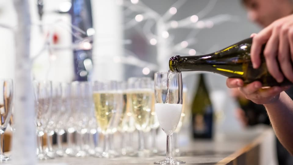 Drinks being poured into glasses