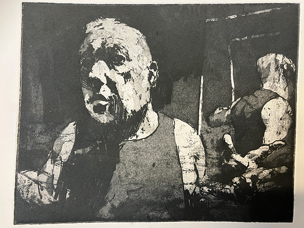 A printed portrait of a man in a black vest.