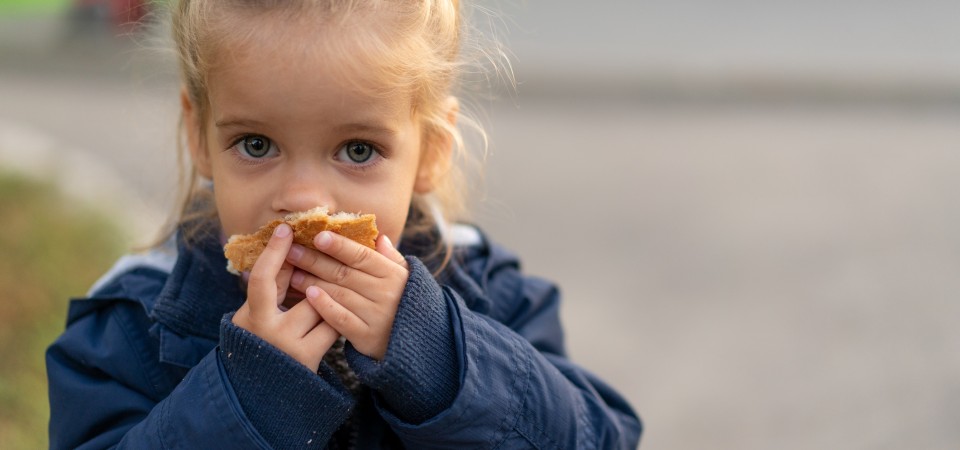 Picture of a young girl in a blue coat