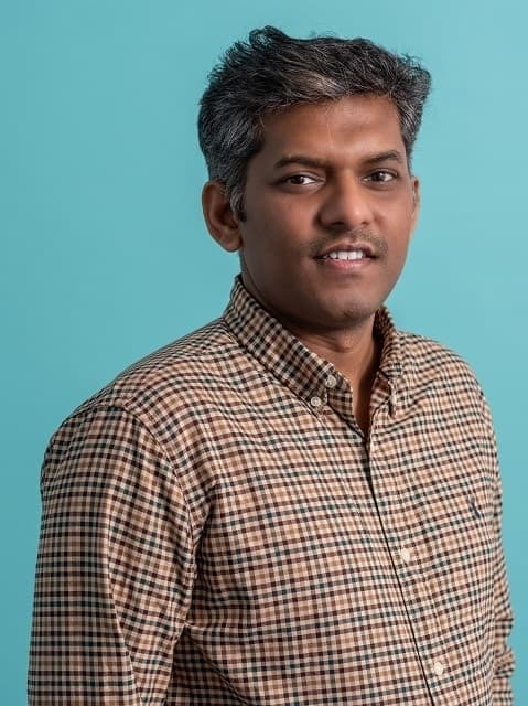 Headshot of Dhamo Veerasamy
