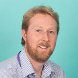 Headshot of Dan