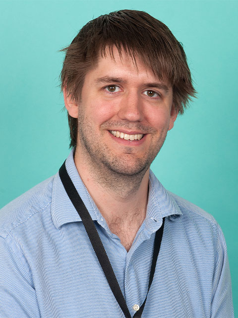 Headshot of James