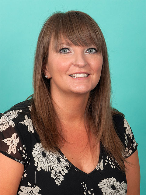 Headshot of Rachel