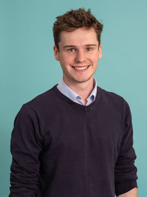 Headshot of Thomas