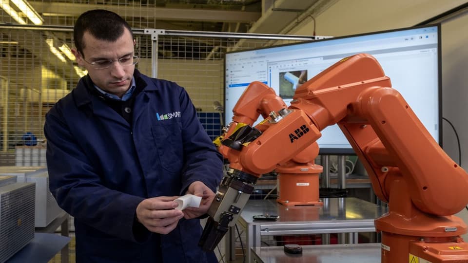 Engineer in lab with machine