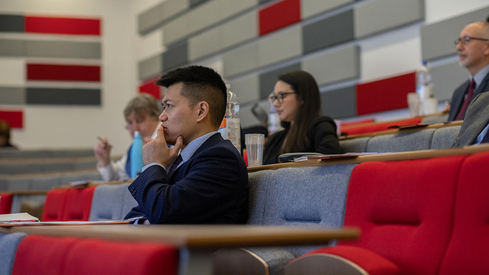 Course participant in lecture theatre