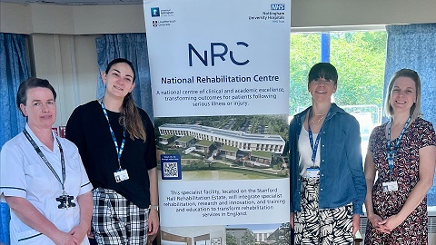 Staff from Linden Lodge posed around promotional banner for NRH