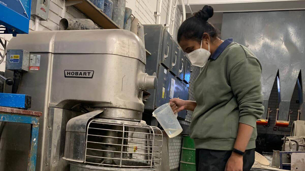 Meena working in a lab