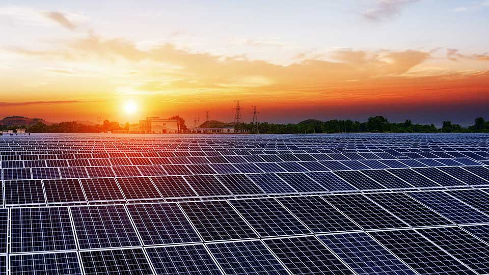 Sunrise over solar panels. 