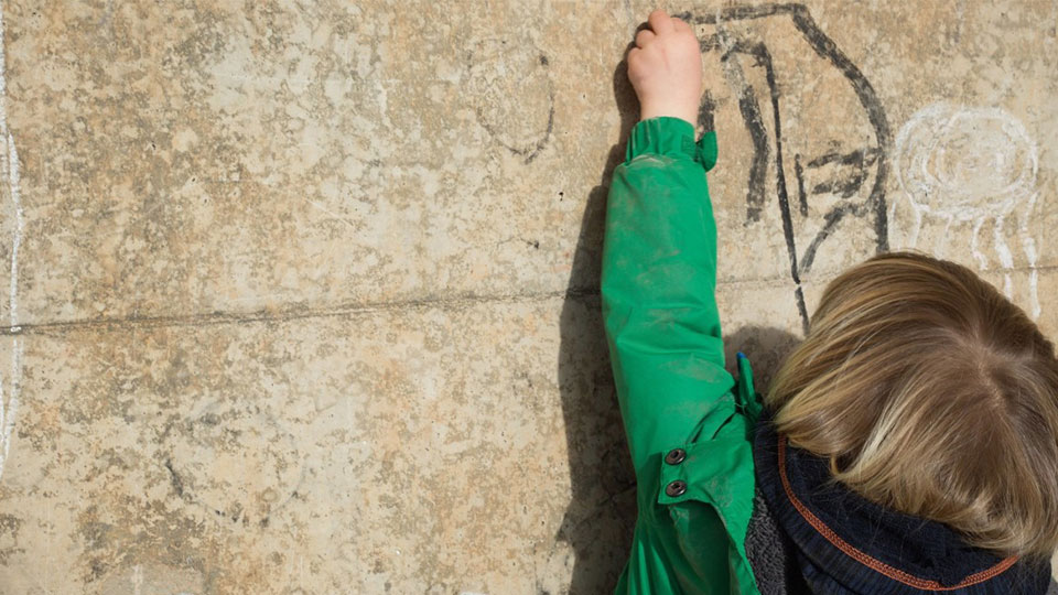 Photo of child drawing