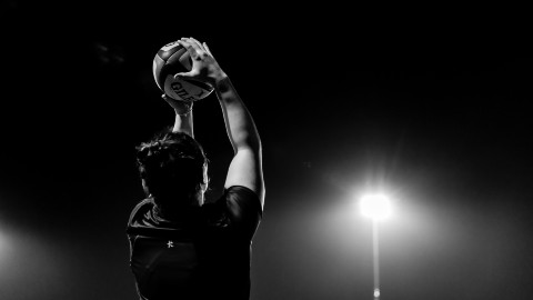 a rugby ball thrown in from the sidelines