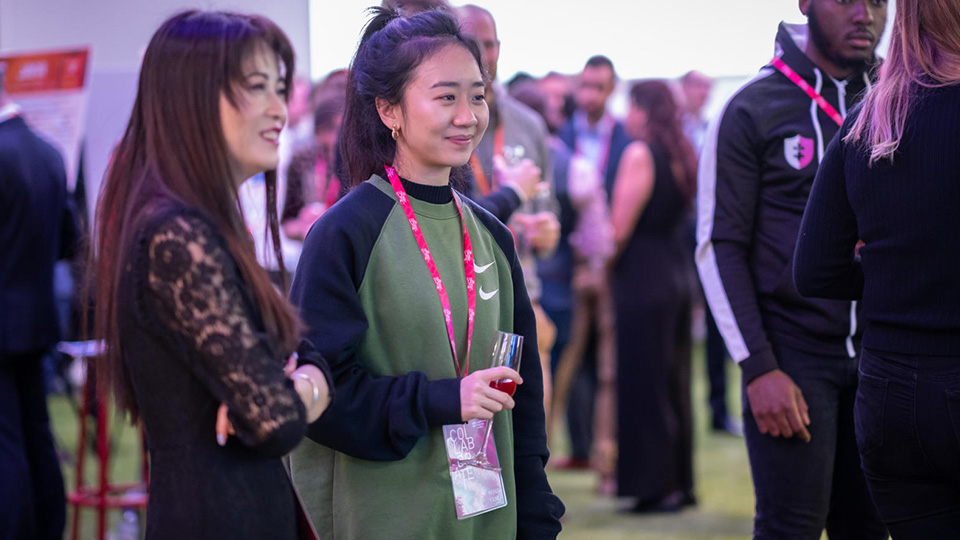 Photo of two students attending the Collaborative Show