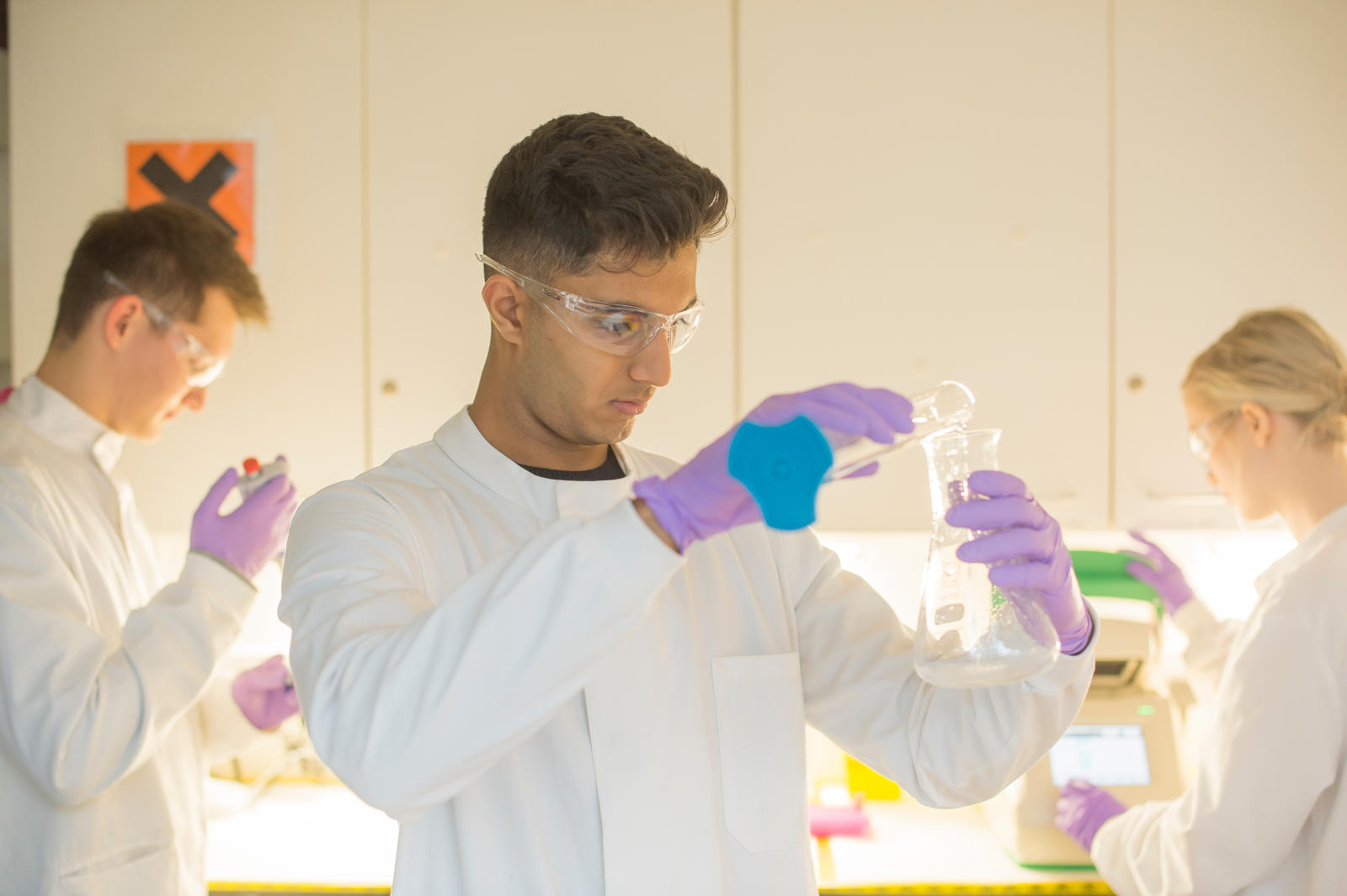 Science students working in a science lab.