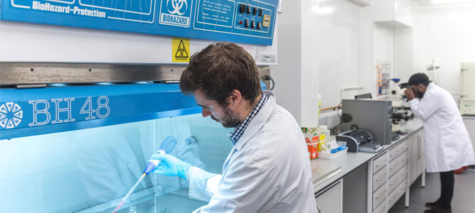 student using chemical lab facility